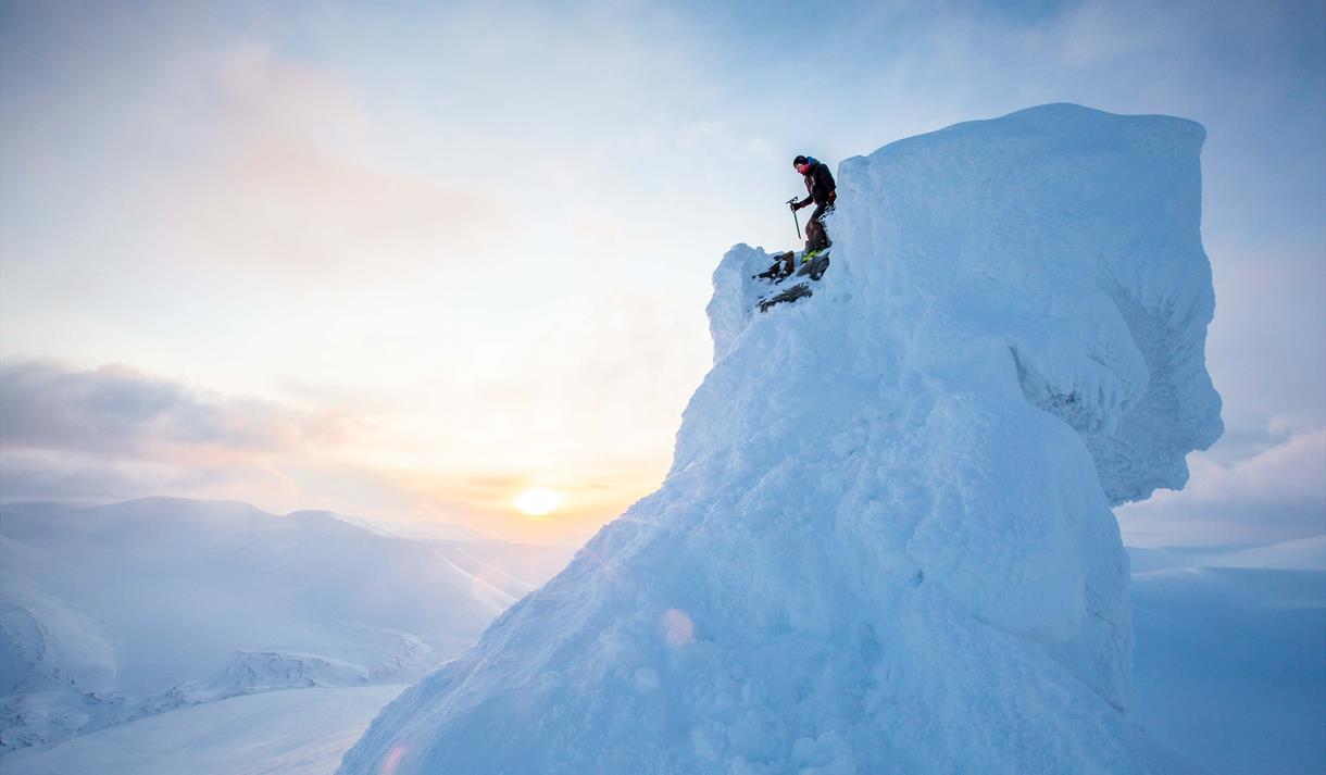 skier on the top of Trollstein mountain on Svalbard